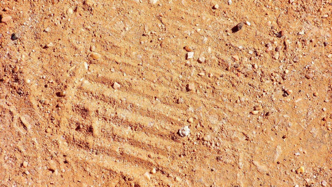 31719278-ground-closeup-with-footprint-on-dust-abstract-background